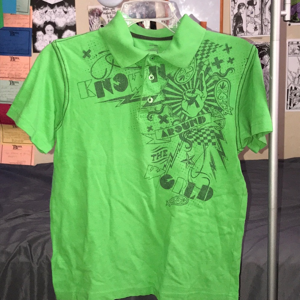 Green collared shirt with artsy design